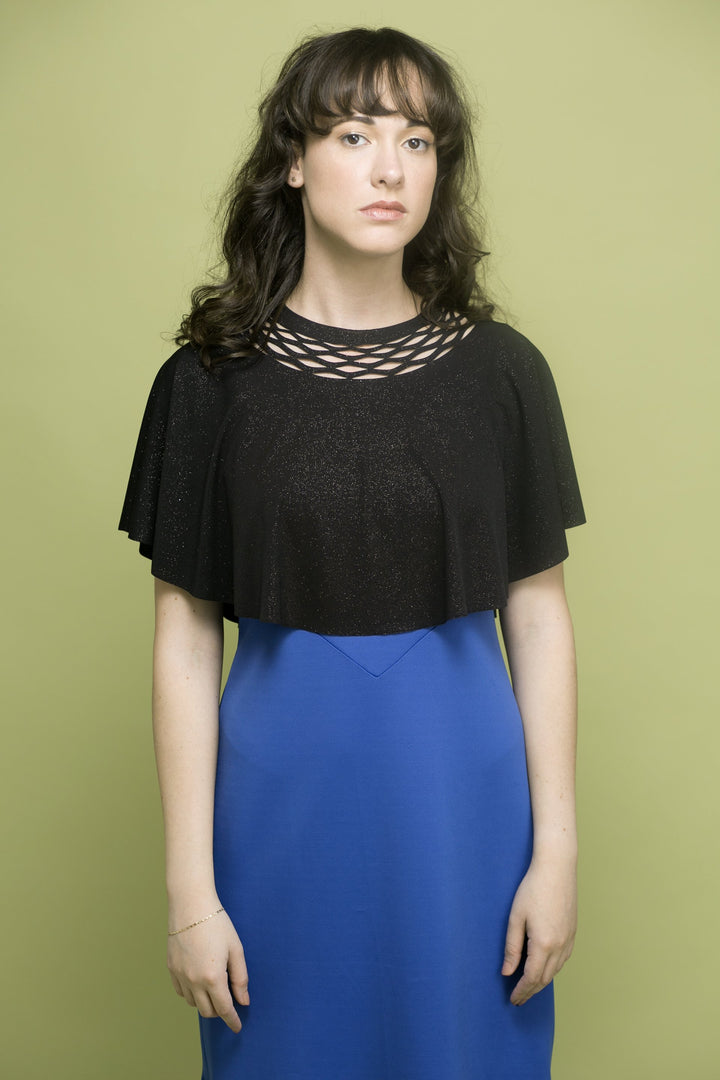 Top for the event - a sparkling black top for the evening with a chain trim